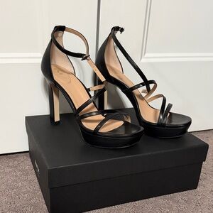 Inez black platform heels